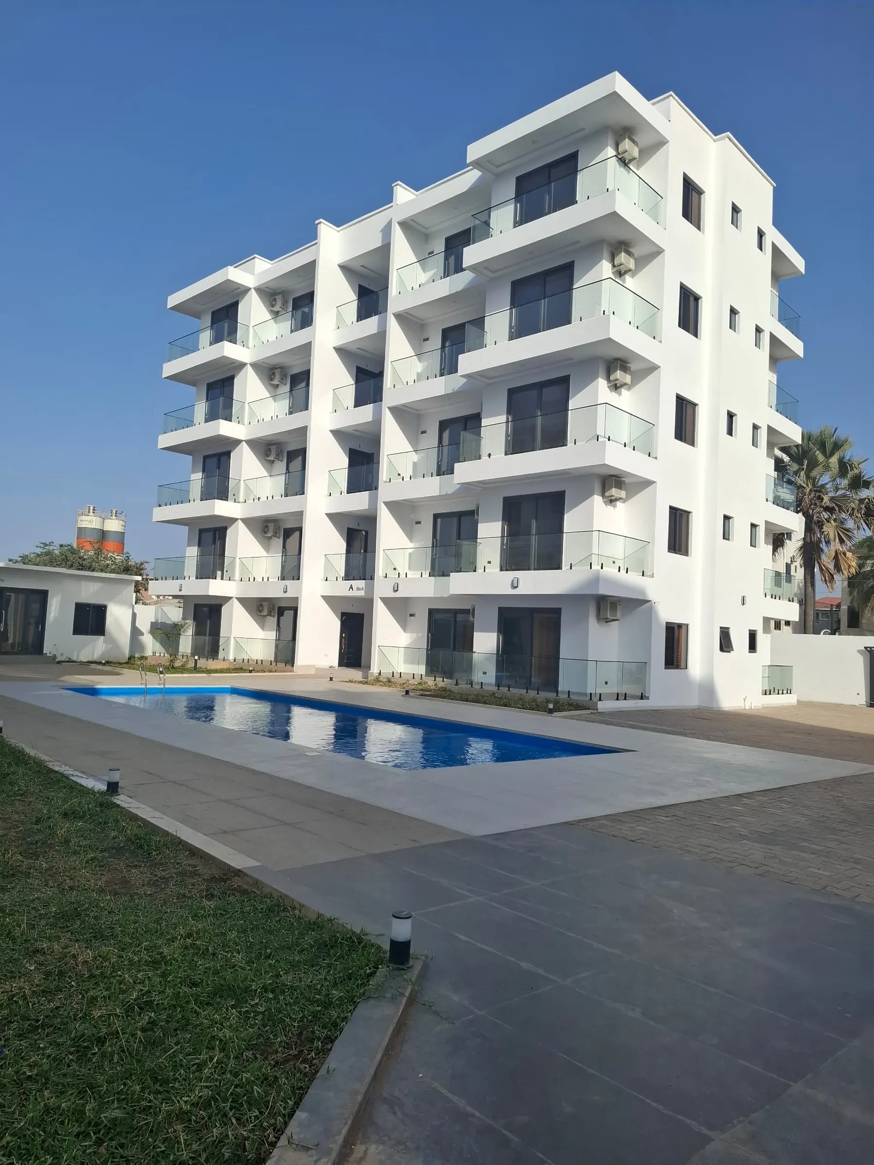 Apartment block and pool from the grounds